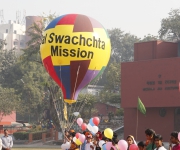 Chidren with Big Ballon message Swatchata Mission