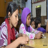 Children in Weaving Activity