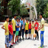 Basket Ball Instructor With Children