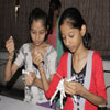 Children in Weaving Activity